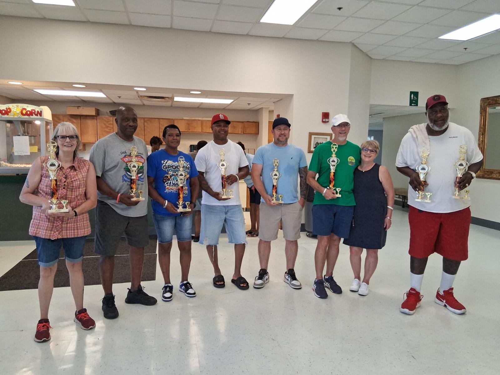 The 2026 UNITY001 Car and Bike Show winners standing together holding their trophies